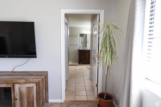 11089 S Justin Dr, Sandy, UT 84092 - hall featuring light tile patterned floors and baseboards