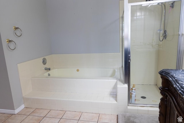 11089 S Justin Dr, Sandy, UT 84092 - full bath with a garden tub, tile patterned floors, and a shower stall