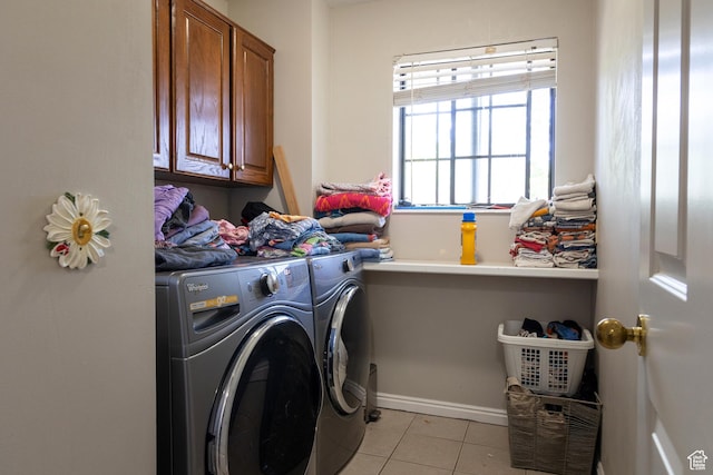 11089 S Justin Dr, Sandy, UT 84092 - laundry room with cabinet space, separate washer and dryer, and light tile patterned flooring