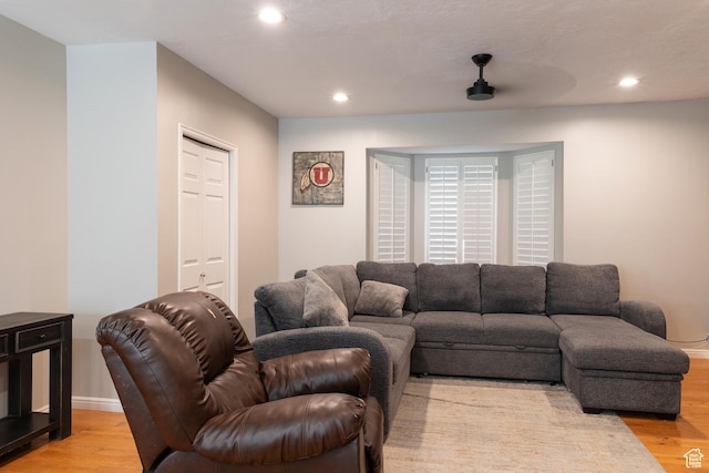 11089 S Justin Dr, Sandy, UT 84092 - living room with light wood-style floors and recessed lighting