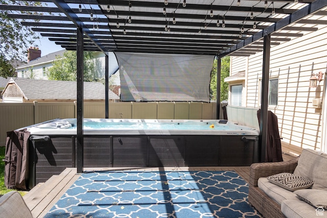 11089 S Justin Dr, Sandy, UT 84092 - view of patio with a hot tub and a pergola
