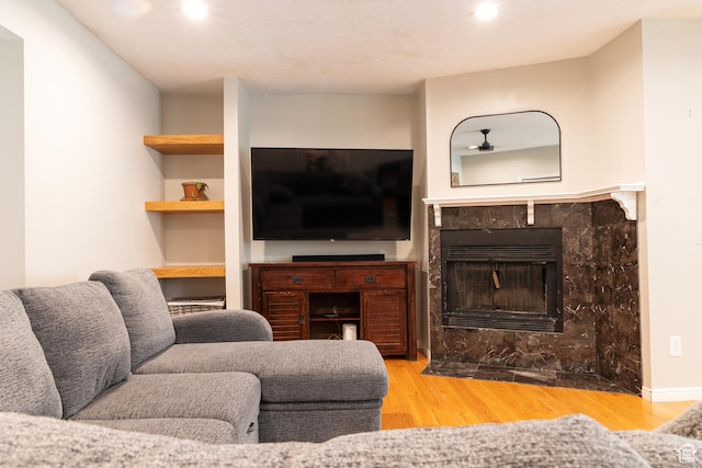 11089 S Justin Dr, Sandy, UT 84092 - living area featuring wood finished floors and a fireplace
