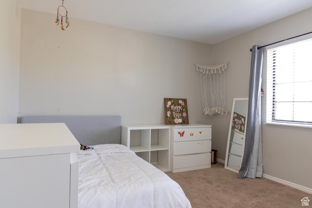 11089 S Justin Dr, Sandy, UT 84092 - bedroom featuring light colored carpet and baseboards