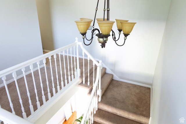 11089 S Justin Dr, Sandy, UT 84092 - stairway featuring a chandelier and carpet