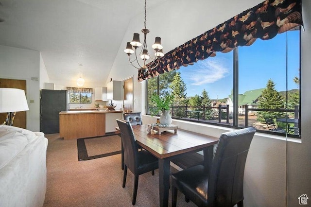 214 S Terry Pkwy, Pine Valley, UT 84781 - dining space with a chandelier, light colored carpet, and lofted ceiling