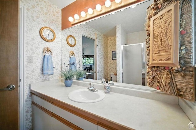 214 S Terry Pkwy, Pine Valley, UT 84781 - bathroom with wallpapered walls, vanity, and a shower stall