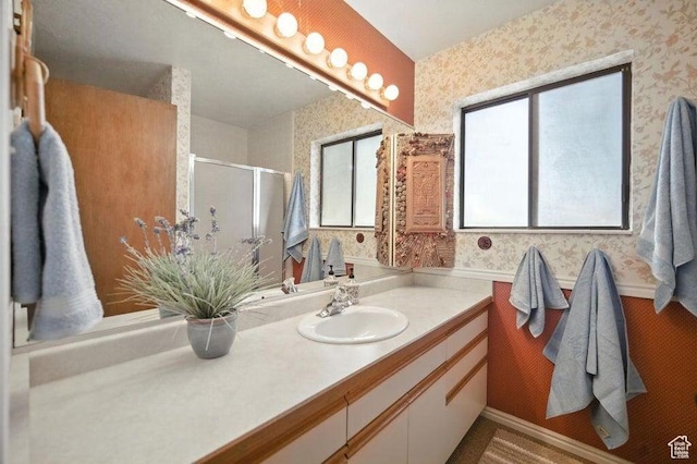 214 S Terry Pkwy, Pine Valley, UT 84781 - bathroom featuring wallpapered walls, vanity, and a stall shower