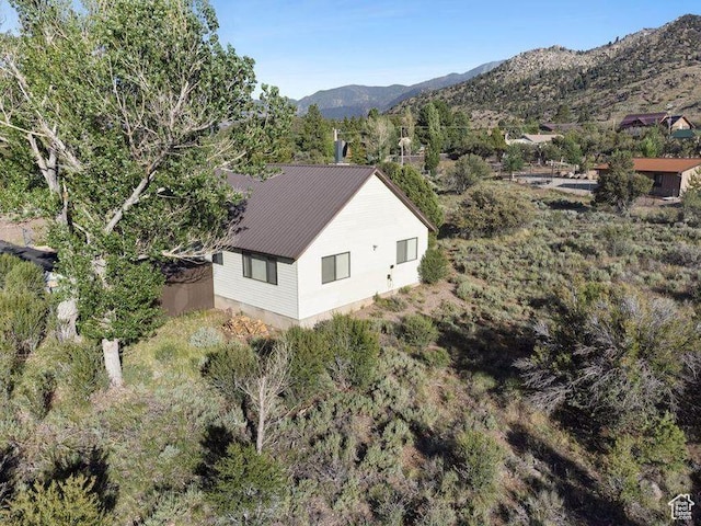 214 S Terry Pkwy, Pine Valley, UT 84781 - aerial overview of property's location with a mountain backdrop