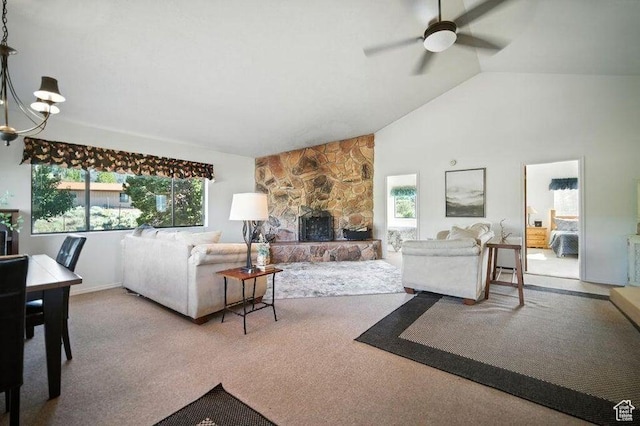 214 S Terry Pkwy, Pine Valley, UT 84781 - living area with carpet, ceiling fan, a fireplace, a chandelier, and high vaulted ceiling
