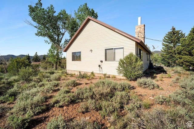 214 S Terry Pkwy, Pine Valley, UT 84781 - view of home's exterior with a chimney