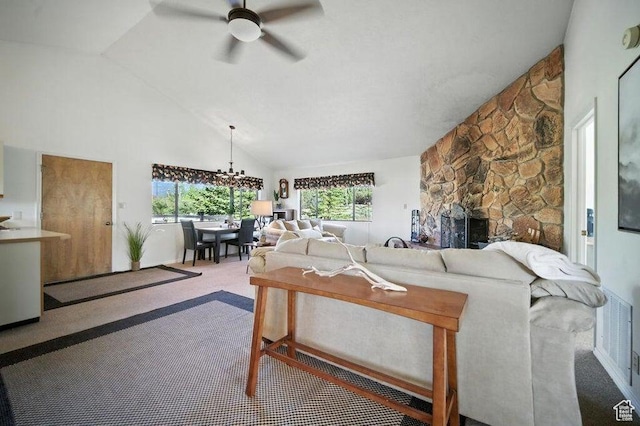 214 S Terry Pkwy, Pine Valley, UT 84781 - living area with a ceiling fan, carpet flooring, high vaulted ceiling, a fireplace, and a chandelier
