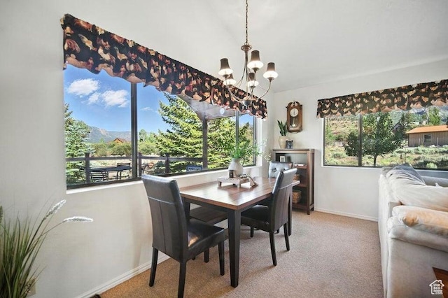 214 S Terry Pkwy, Pine Valley, UT 84781 - dining space with a chandelier, light carpet, and healthy amount of natural light