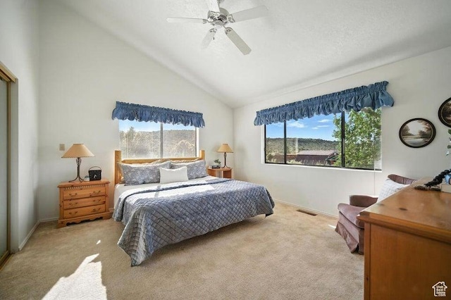 214 S Terry Pkwy, Pine Valley, UT 84781 - carpeted bedroom featuring multiple windows, lofted ceiling, and ceiling fan