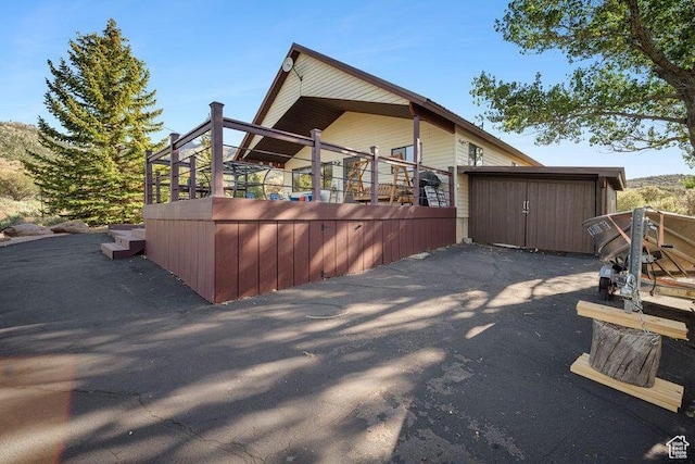 214 S Terry Pkwy, Pine Valley, UT 84781 - view of side of home featuring a storage shed and driveway