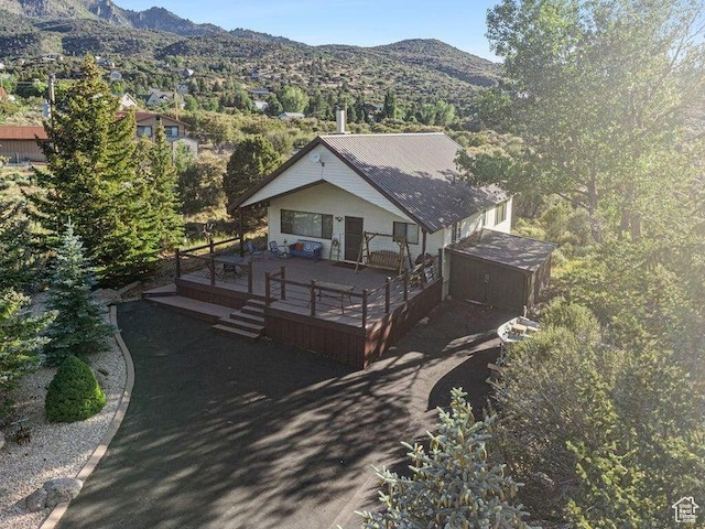 214 S Terry Pkwy, Pine Valley, UT 84781 - view of front facade with a deck with mountain view