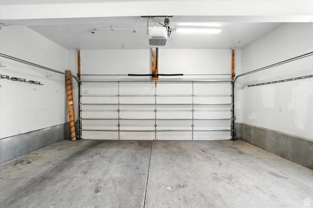 1298 Eastridge Cir, Logan, UT 84321 - garage featuring a garage door opener