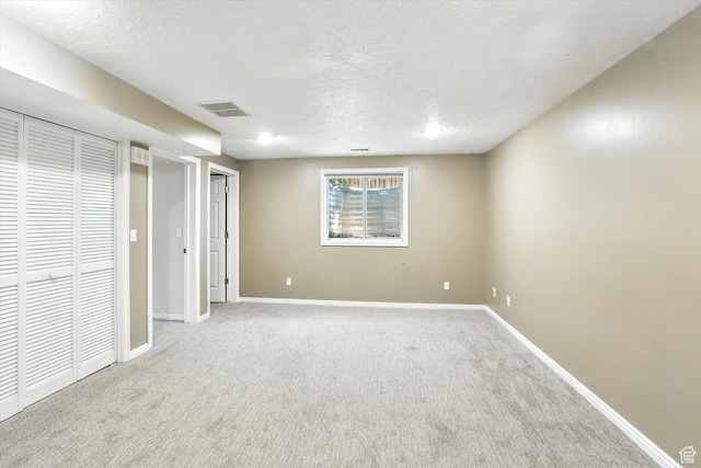 1298 Eastridge Cir, Logan, UT 84321 - unfurnished bedroom featuring a textured ceiling and carpet flooring