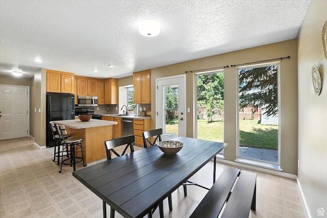 1298 Eastridge Cir, Logan, UT 84321 - dining space featuring a textured ceiling and recessed lighting