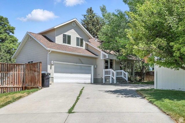 1298 Eastridge Cir, Logan, UT 84321 - traditional-style house with driveway and roof with shingles