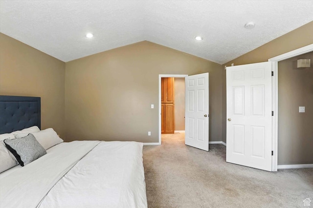 1298 Eastridge Cir, Logan, UT 84321 - bedroom featuring vaulted ceiling, light colored carpet, and recessed lighting