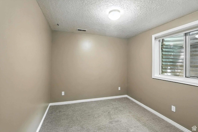 1298 Eastridge Cir, Logan, UT 84321 - carpeted empty room featuring a textured ceiling