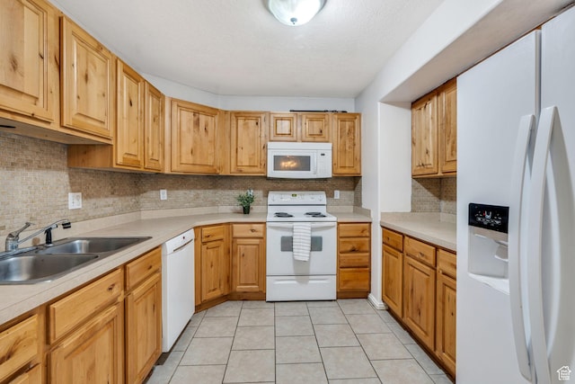 8246 N Cedar Springs Rd E Unit 8, Eagle Mountain, UT 84005 - kitchen featuring white appliances, light countertops, backsplash, and light tile patterned floors