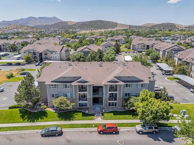 8246 N Cedar Springs Rd E Unit 8, Eagle Mountain, UT 84005 - aerial view of residential area with a mountain backdrop