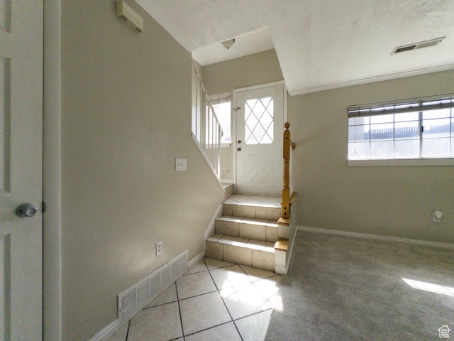 1790 W Homestead Farm Ln Unit 4, West Valley City, UT 84119 - stairs with plenty of natural light and tile patterned flooring