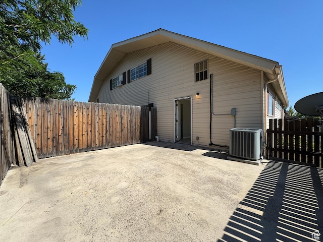 1790 W Homestead Farm Ln Unit 4, West Valley City, UT 84119 - back of house featuring a patio area