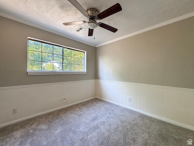 1790 W Homestead Farm Ln Unit 4, West Valley City, UT 84119 - spare room with crown molding, a ceiling fan, wainscoting, carpet flooring, and a textured ceiling