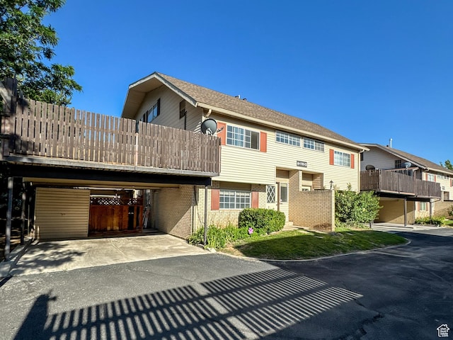 1790 W Homestead Farm Ln Unit 4, West Valley City, UT 84119 - traditional-style home featuring brick siding