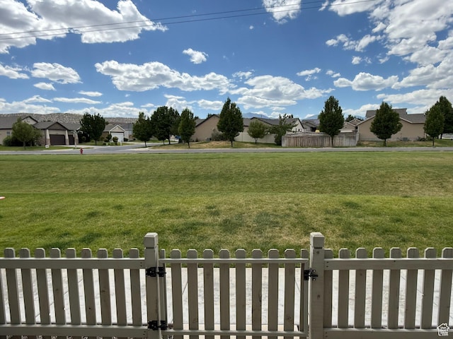 7579 N Cottage Ln, Eagle Mountain, UT 84005 - fenced yard with a gate and a residential view