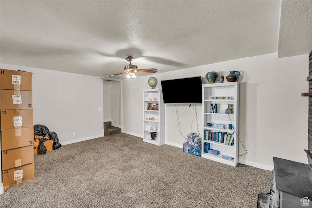 120 N Scenic Dr E, Washington, UT 84780 - carpeted living area featuring ceiling fan and a textured ceiling