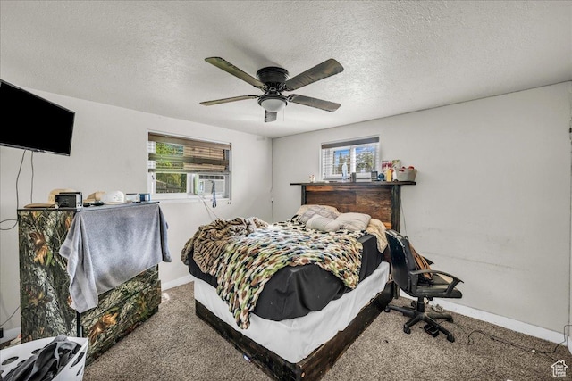 120 N Scenic Dr E, Washington, UT 84780 - carpeted bedroom with multiple windows, ceiling fan, and a textured ceiling