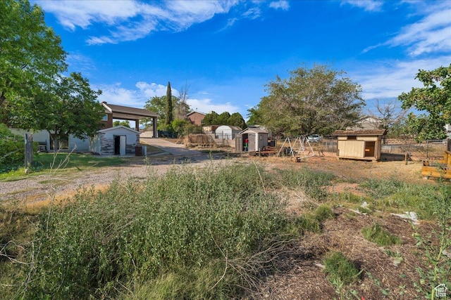 120 N Scenic Dr E, Washington, UT 84780 - view of yard with a storage shed