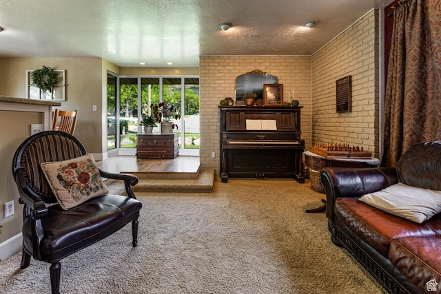 453 Sheridan Cir, Centerville, UT 84014 - living room featuring carpet flooring, a textured ceiling, and brick wall