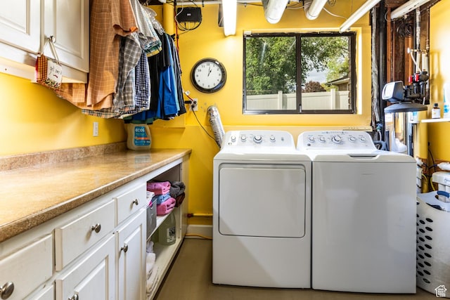 453 Sheridan Cir, Centerville, UT 84014 - laundry room featuring washer and dryer and cabinet space