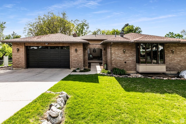 453 Sheridan Cir, Centerville, UT 84014 - single story home with an attached garage, concrete driveway, a front yard, and brick siding