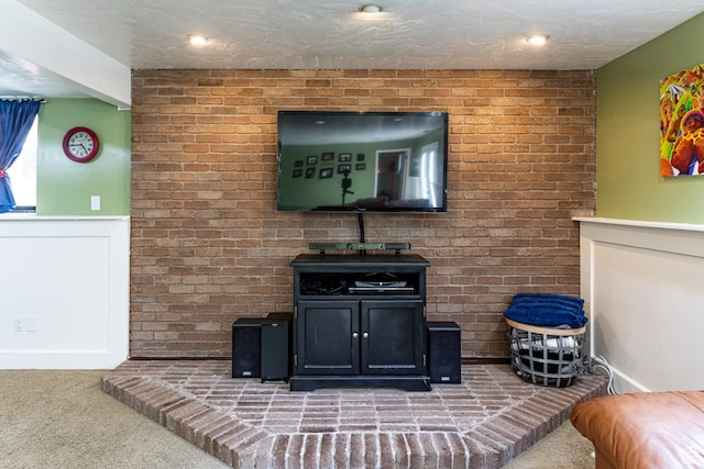 453 Sheridan Cir, Centerville, UT 84014 - carpeted living room featuring a wood stove and wainscoting