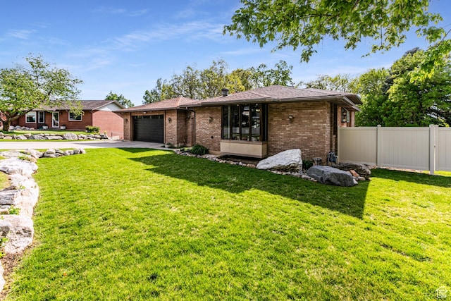 453 Sheridan Cir, Centerville, UT 84014 - view of front facade featuring brick siding, concrete driveway, and an attached garage
