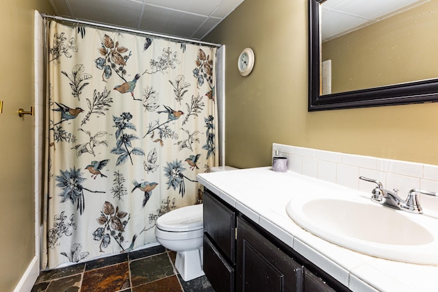 453 Sheridan Cir, Centerville, UT 84014 - bathroom featuring vanity, stone finish floors, and a shower with shower curtain