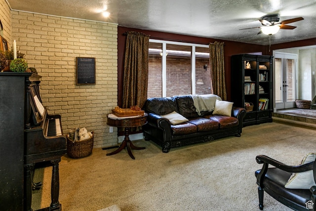 453 Sheridan Cir, Centerville, UT 84014 - carpeted living area featuring plenty of natural light, a ceiling fan, a textured ceiling, and brick wall