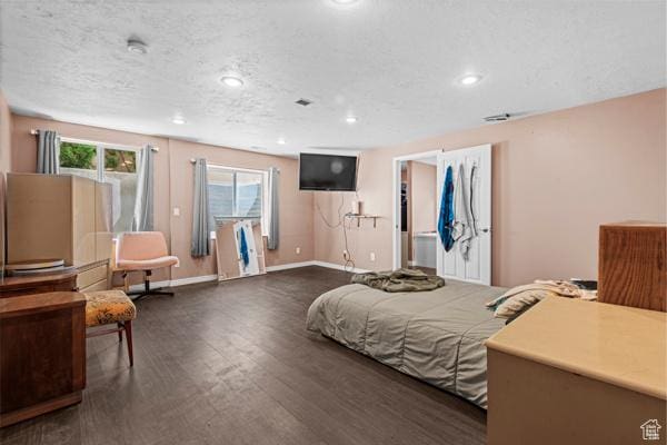13032 S 1300 W, Riverton, UT 84065 - bedroom featuring wood finished floors, recessed lighting, and a textured ceiling