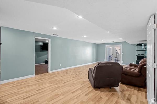 13032 S 1300 W, Riverton, UT 84065 - sitting room with light wood-style flooring, french doors, and recessed lighting