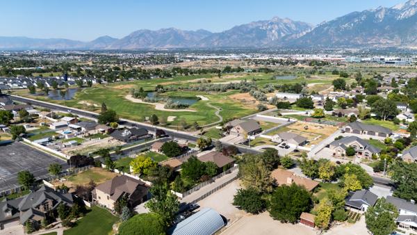 13032 S 1300 W, Riverton, UT 84065 - aerial perspective of suburban area featuring a water and mountain view and a golf club