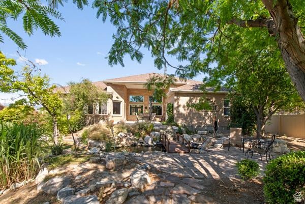 13032 S 1300 W, Riverton, UT 84065 - back of property with a patio area