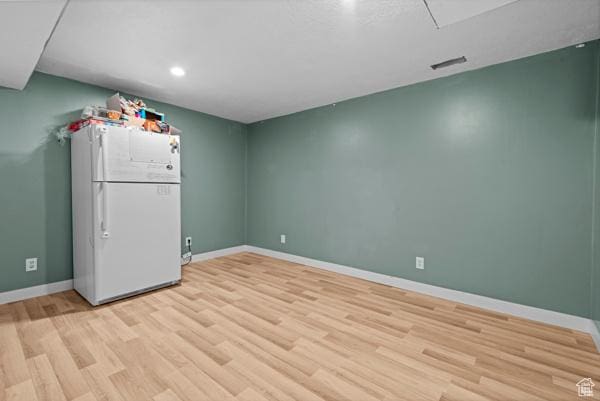 13032 S 1300 W, Riverton, UT 84065 - empty room with light wood-style flooring and recessed lighting