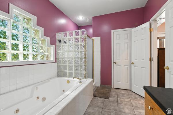 13032 S 1300 W, Riverton, UT 84065 - full bath featuring a whirlpool tub, vanity, a walk in shower, and tile patterned flooring