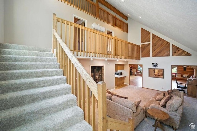 10 S 900 E, Pine Valley, UT 84781 - living area with high vaulted ceiling, light carpet, and stairway