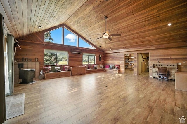 10 S 900 E, Pine Valley, UT 84781 - living area featuring wooden walls, a wood stove, high vaulted ceiling, ceiling fan, and wood ceiling